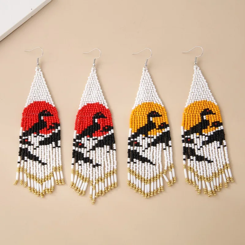 

Rice bead earrings Tassel The bird Design Sunrise Geometry Originality Hand knitting Bohemia Fashion Simple Beaded earrings