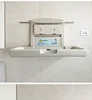 Y  The third bathroom care desk is wall mounted, with a children's diaper changing table and a foldable bathroom safety chair 4
