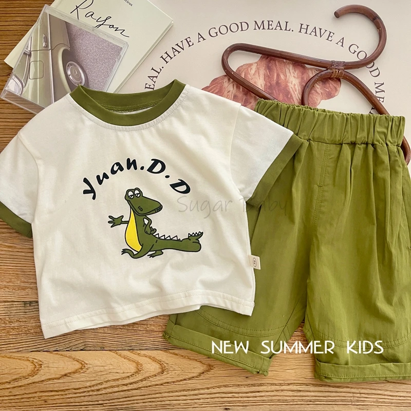 

Комплект детской одежды с мультипликационным принтом, новинка 2023, летняя футболка с коротким рукавом и принтом динозавра для маленьких мальчиков, однотонные брючные комплекты, милая повседневная одежда для мальчиков