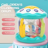 Baby multifunctional light and music hand drum, rotating projection drum early education machine, educational toy 1