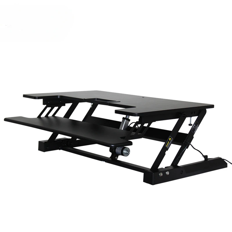 

Electric computer lifts desk and sits alternately.