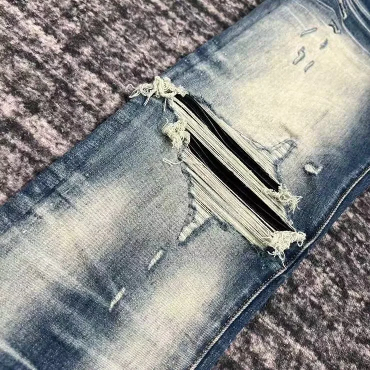 men ripped leather patch distressed mx1 indigo jeans 4