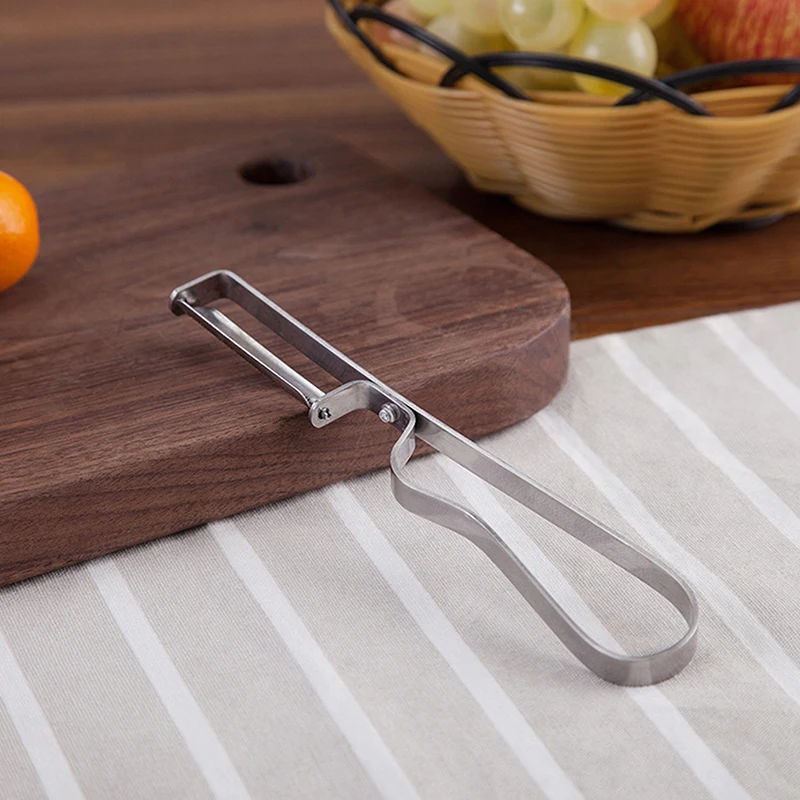 มีดปอกมันฝรั่งและแครอทอเนกประสงค์สำหรับเครื่องปอกผลไม้ผักสแตนเลสอุปกรณ์ครัวด้ามหนาทำความสะอาดง่าย 1