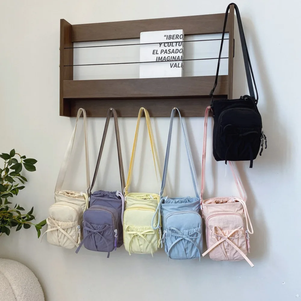 Lightweight Women's Crossbody Bag with Water Bottle Holder and Knot Design for Outdoor Sports and Travel