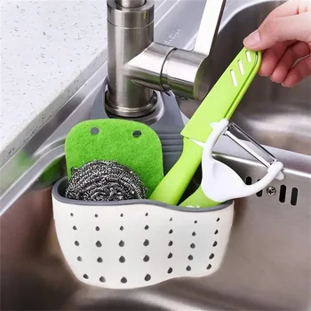 Adjustable double sink hanging basket for sponge and kitchen tool storage. 1
