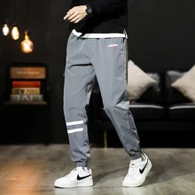 

Spring Summer 2022 Men's Splicing New Sports Pants Loose Plus Size Casual Jogging Pants Teens Oversized Fashion Streetwear M-8XL