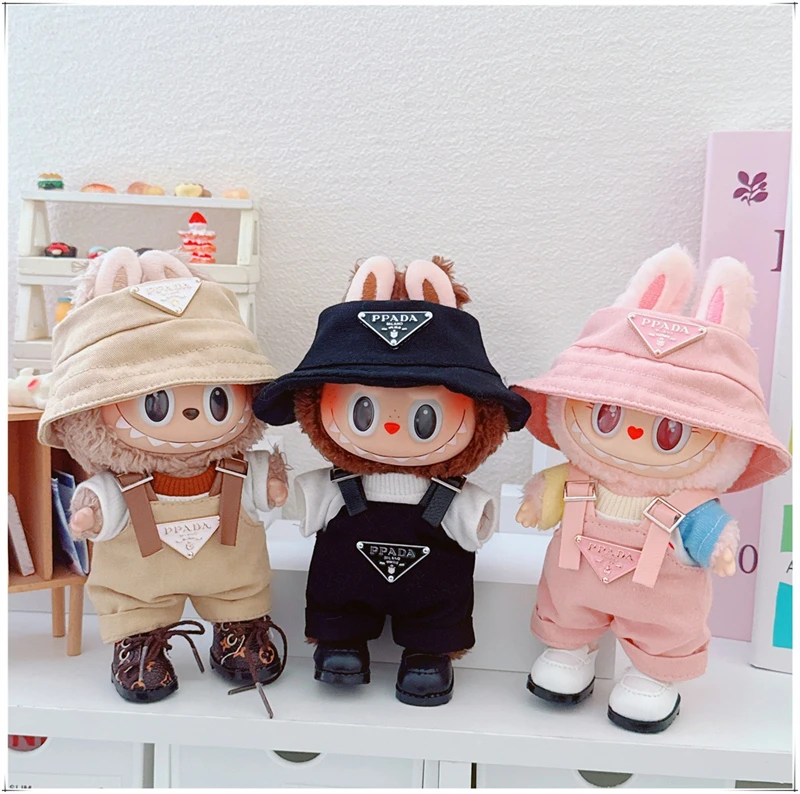 🧢👖 Cute Meets Classic – Mini Style for Your Labubu Give your Labubu V1/V2 plush doll a fresh new look with this 15–17cm Outfit & Accessories Set. Including a pair of adorable mini overalls and a matching hat, this set adds instant charm and personality to your plush collection. 🎁 Ideal as a birthday gift, collector’s item, or display piece, this outfit makes your plush doll stand out in any collection or scene. ✨ What’s Inside: Custom-sized for 15–17cm Labubu V1/V2 dolls Includes: stylish overalls + cute mini hat Made from soft, durable, and doll-safe materials Easy to put on and remove for play, decoration, or photos Great for Kawaii lovers, Labubu fans, and collectors 🔔 Note: This is a custom-made product and not officially affiliated with Labubu or Pop Mart.