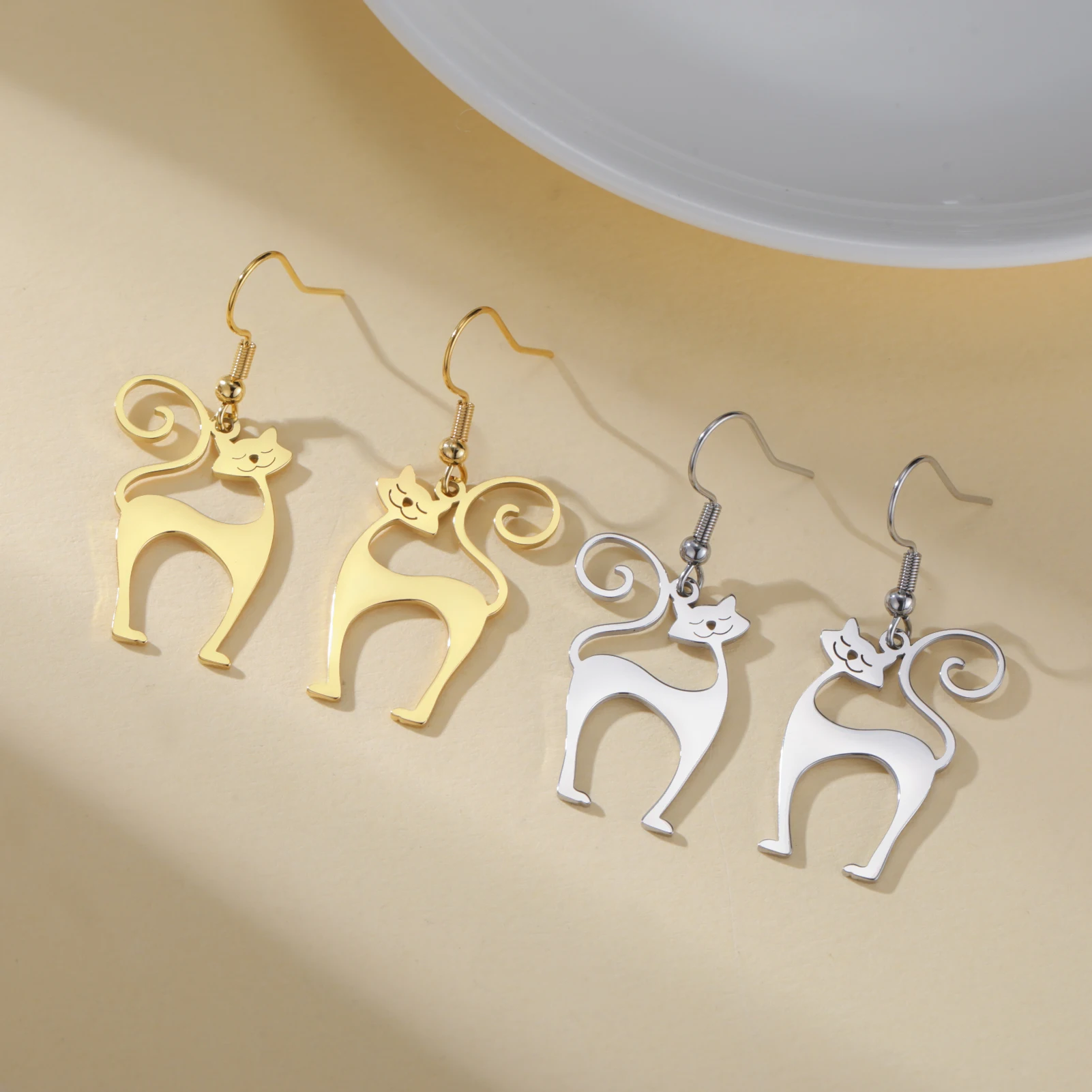 2291-c1c5ae.jpg dangling cat earrings