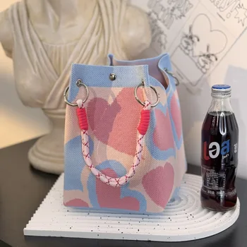 Borsa tote in tessuto grande Capaci Borsa dal design semplice e versatile per donna 2025 Nuova borsa lavorata a maglia con fiore scavato