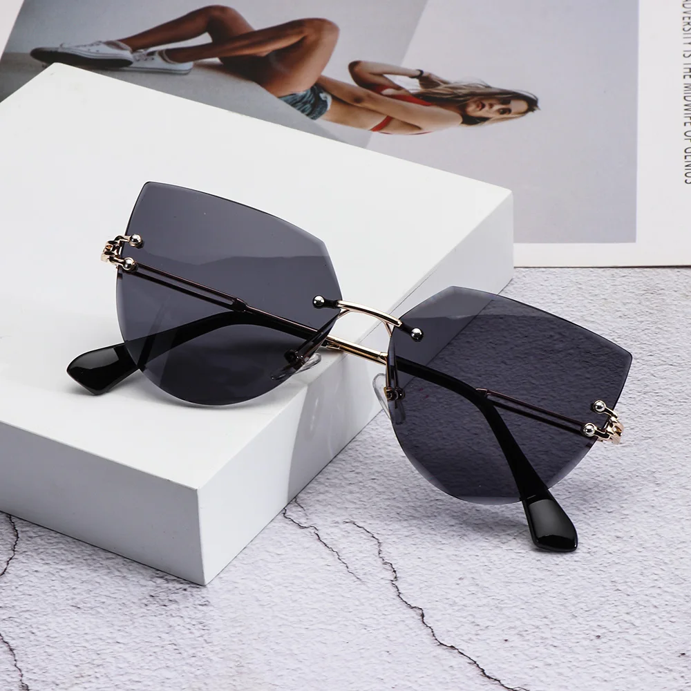 Sexy Rimless Cat Eye Sunglasses Luxury Design Women Metal Sunglasses Fashion Shades UV400 Protection Eyewear 1pc polarized sunglasses,sports sunglasses,sport sunglasses,metal sunglasses