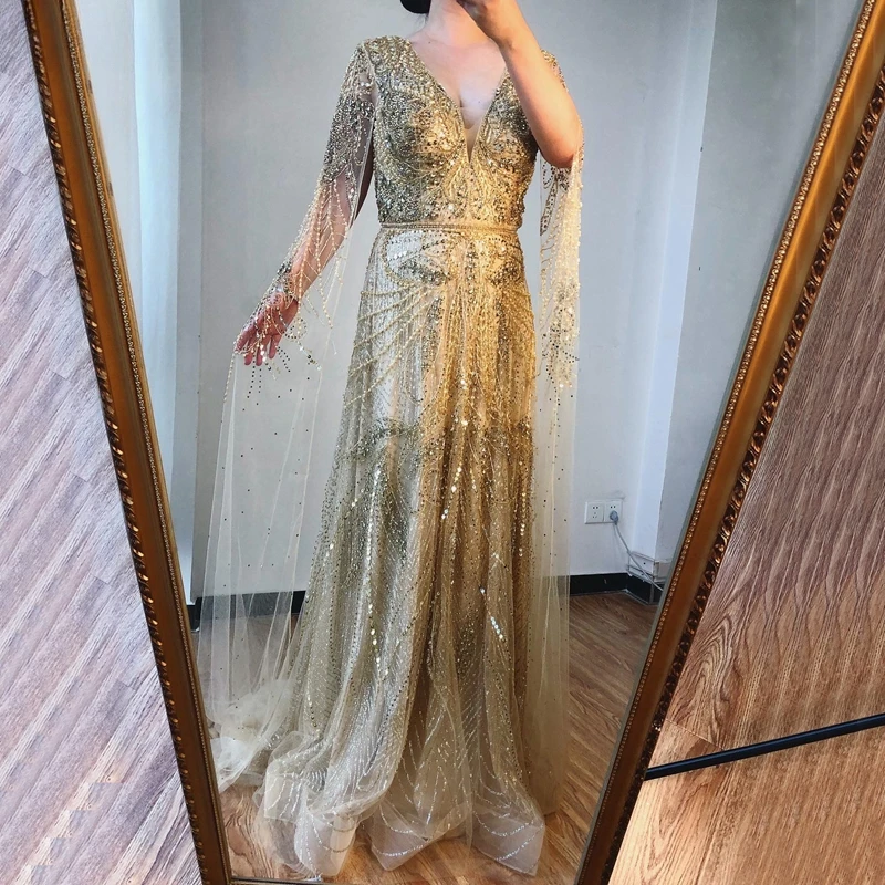 

Gold Glitter A Line Cape Sleeves Evening Dresses Customized Best Price Neck Pearls Beaded Formal Party Gowns For Women