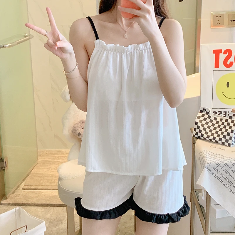 Summer new thin casual sweet solid color sexy suspender with chest pad 2 sets of young girls' home clothes free delivery
