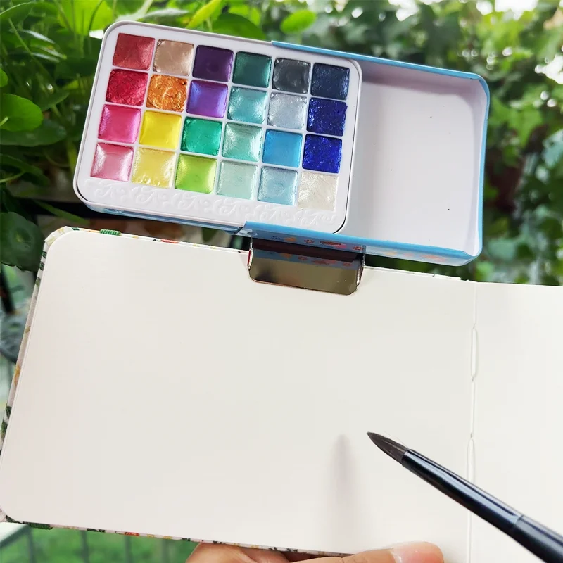 Professional Pearl Watercolor Set: 24 Metallic Colors, Travel Brush & Fine Grain Sketchbook with Embroidery Bag Art Supplies