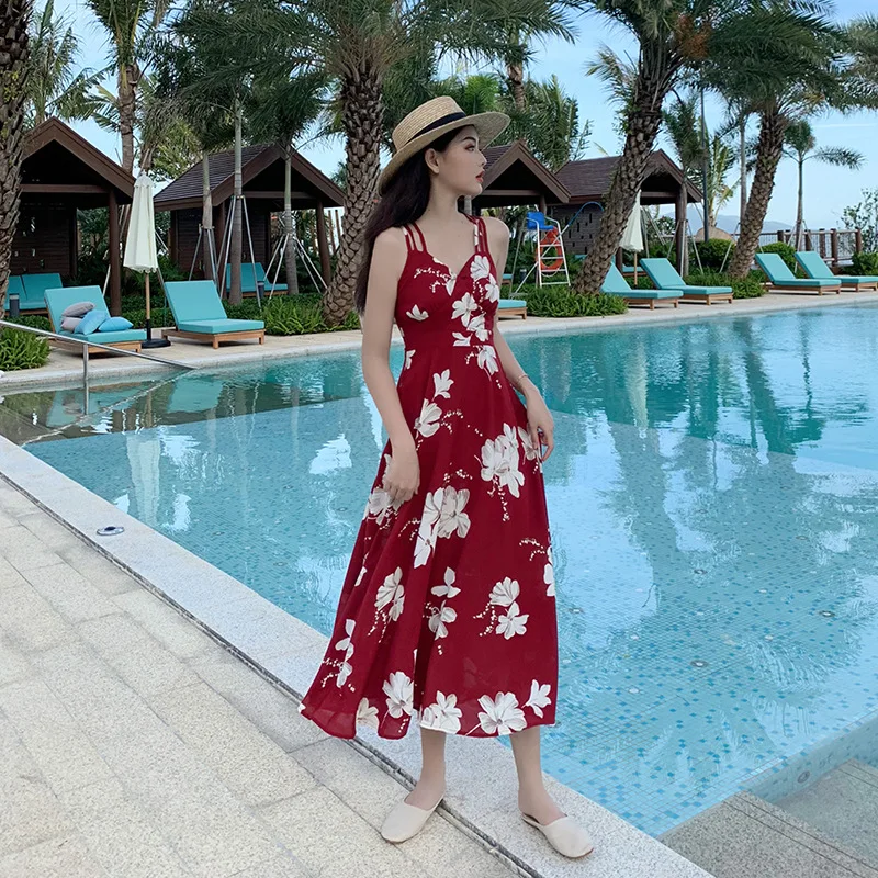 

Women's Korean version medium length printed backless sexy vacation beach dress with strap dress for women