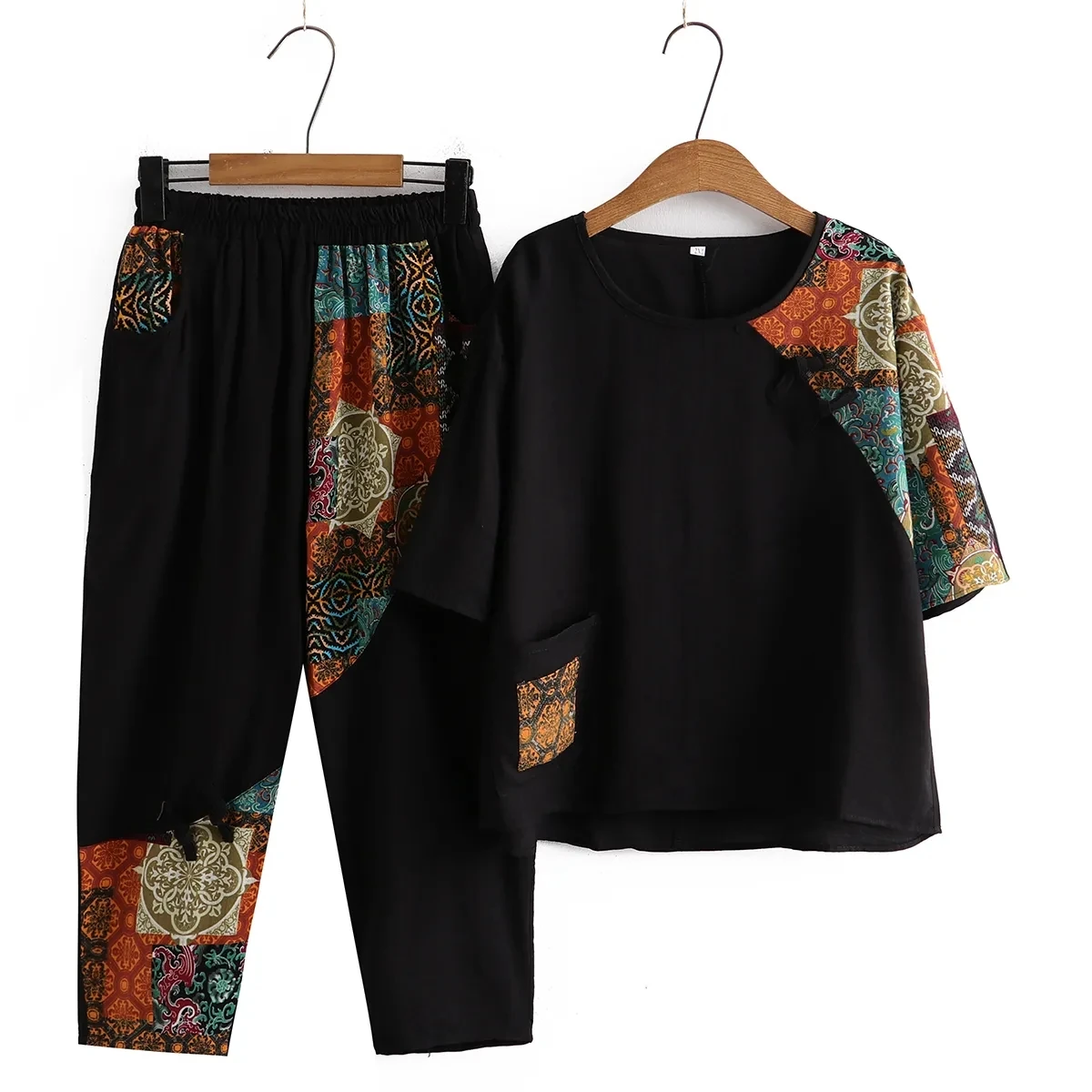 

2023 Summer Cotton And Hemp Suit Fashion Suit loose And Thin Printed Short Sleeved Top+ Casual Seven Pants Two-piece Set 5XL
