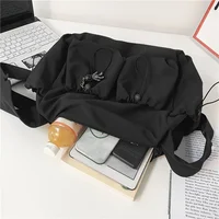 Fashionable Crossbody Bag with Drawstring Accent - Spacious & Secure Zipper Closure - Includes Stylish Bag Charm - Image 5