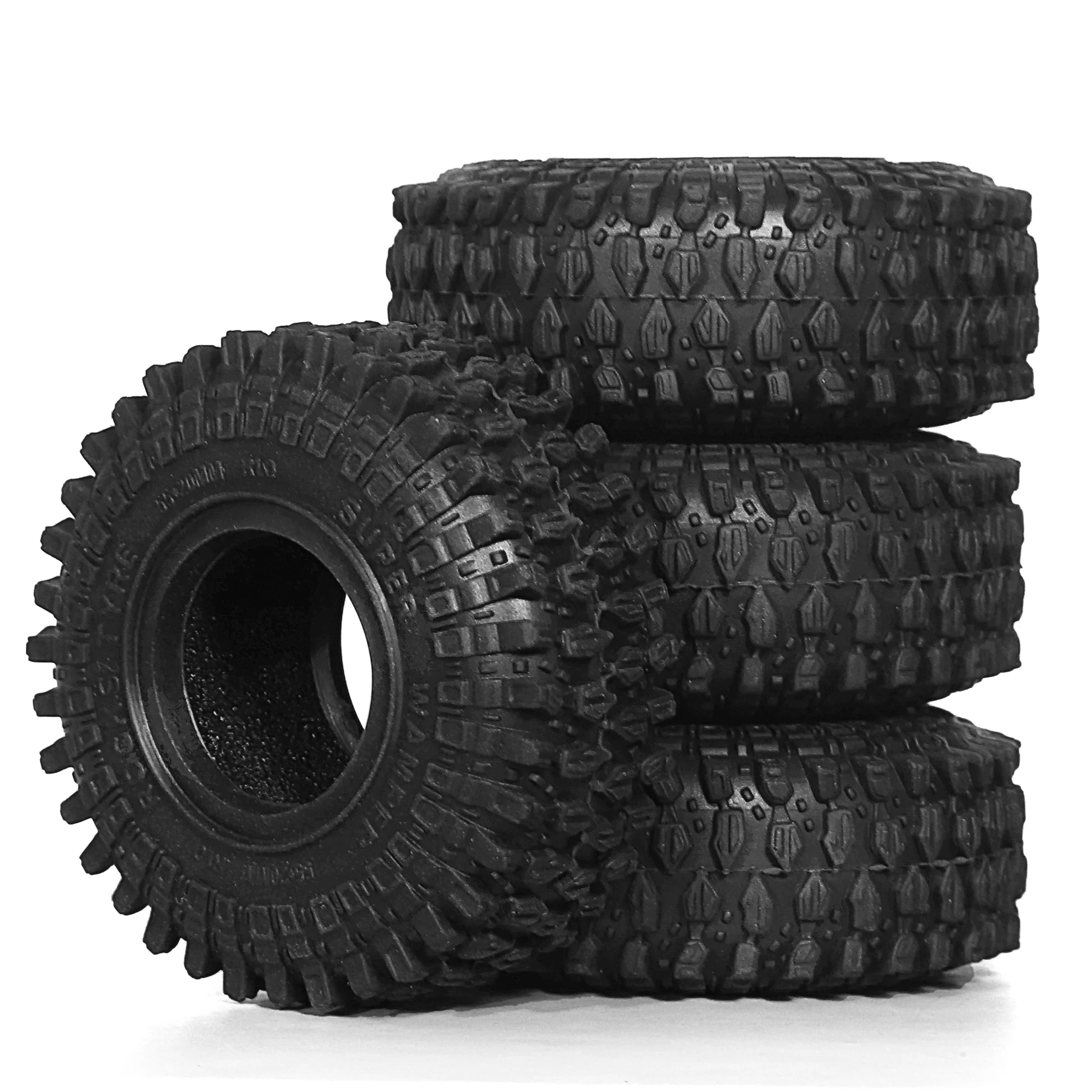 Comparaison taille des pneus Crawler RED SPIDER 1.0 55mm à côté d'une pile de pièces
