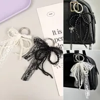 Porte-clés en dentelle mignon, nœud blanc/noir, pendentif de sac, chaîne de téléphone, accessoire d'emballage 2