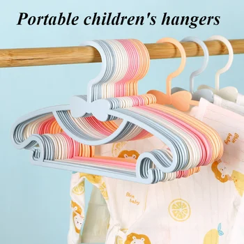 Percha de plástico portátil para bebé, organizador de ropa, sin rastro, a prueba de viento