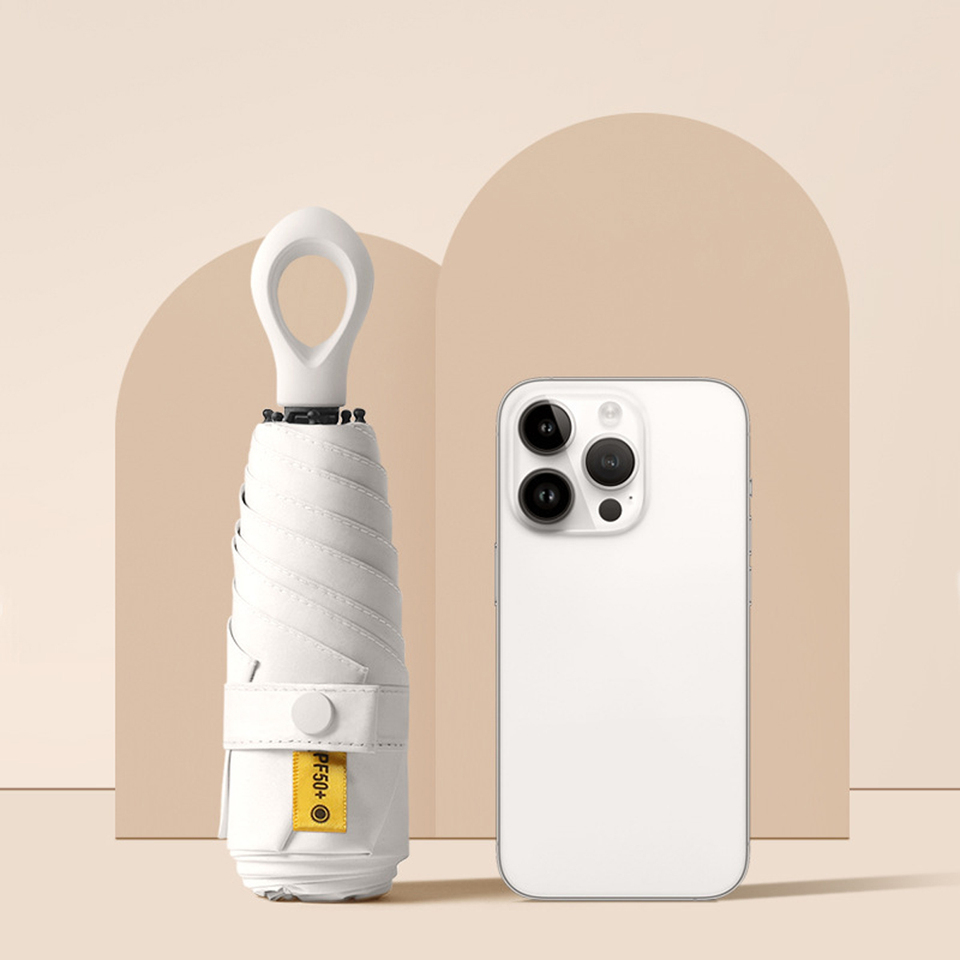 Portable Mini Capsule Umbrella, Protects You From UV Rays & Rain With A Looped Handle For Easy Carrying