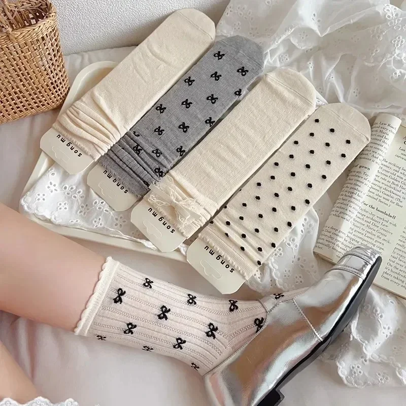 Description Picture 2 of itemJapanese Hollow Out Long Socks Women Girls Lace Sweet Bow Sock Casual Crew Loose Sox Streetwears Summer Thin Mid-tube Stockings
