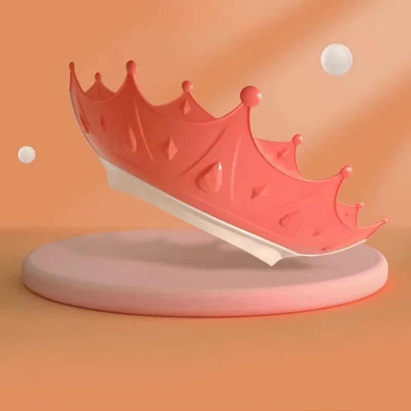 Silicone shampoo hat rolled up compactly for easy storage