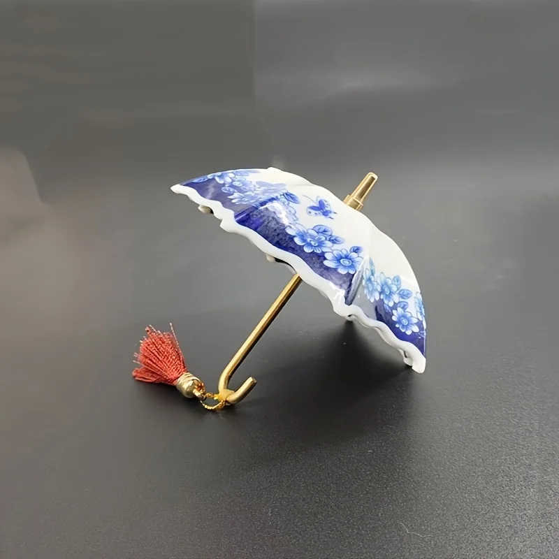 Elegant Blue and White Floral Ceramic Tea Strainer with Tassel - Decorative Umbrella-Shaped Tea Leaf Filter