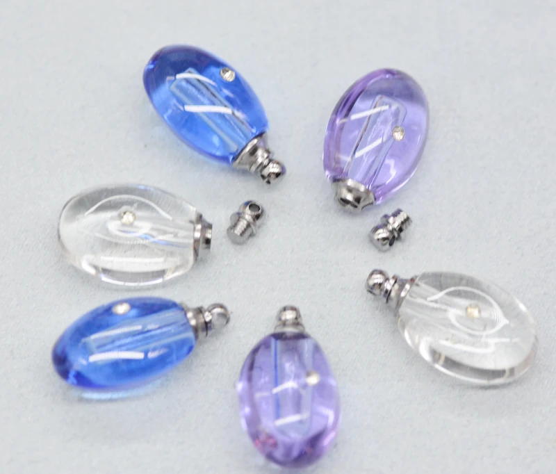 

100PCS/LOT water droplets. oval. Crystal wishing bottle. Perfume bottle pendant. Mixed colors are sent randomly