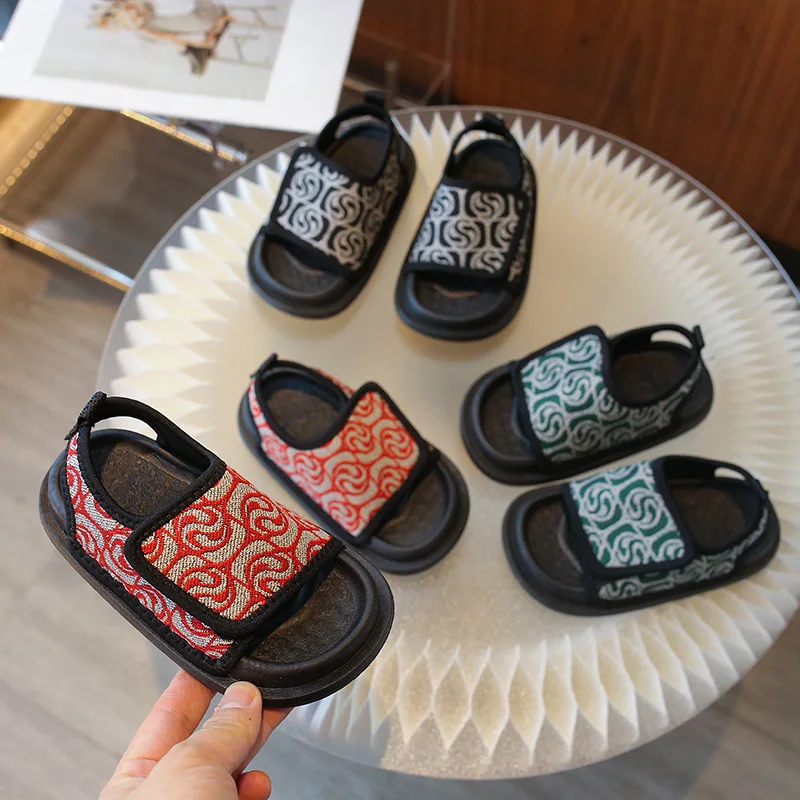 

Детские летние сандалии, новинка 2024, Модная вязаная обувь с открытым носком и мягкой подошвой для мальчиков, повседневные износостойкие сандалии с узорами для девочек