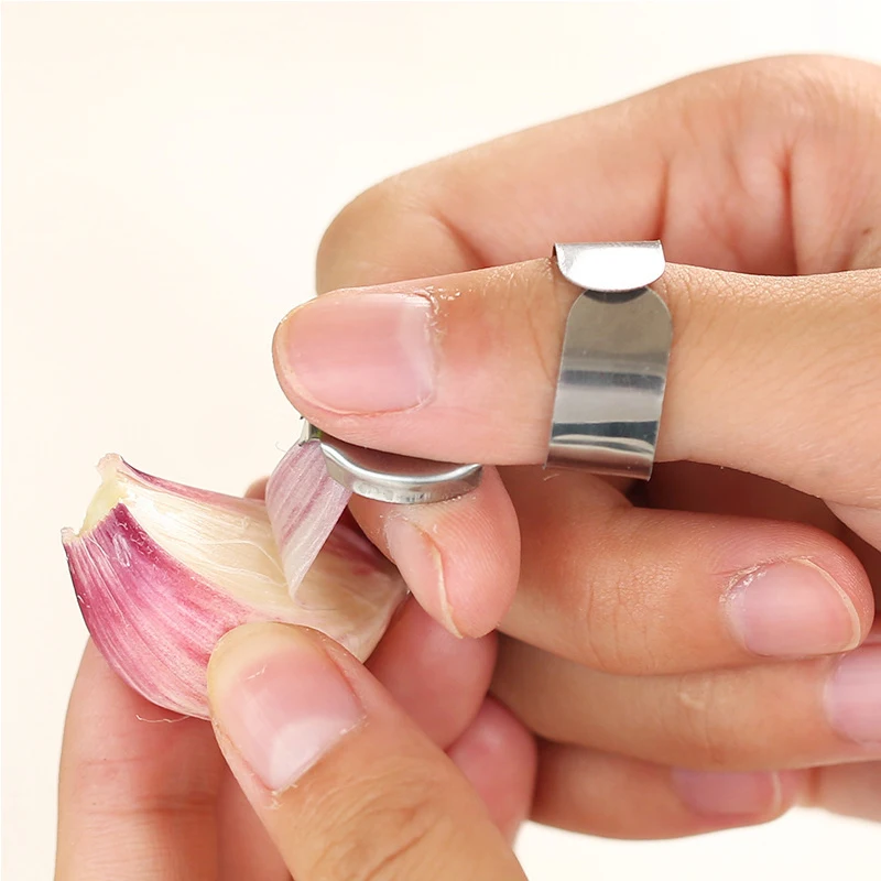 GarlicCrusherMultifunctionalFingerChestnutPeelerGarlicPeeler