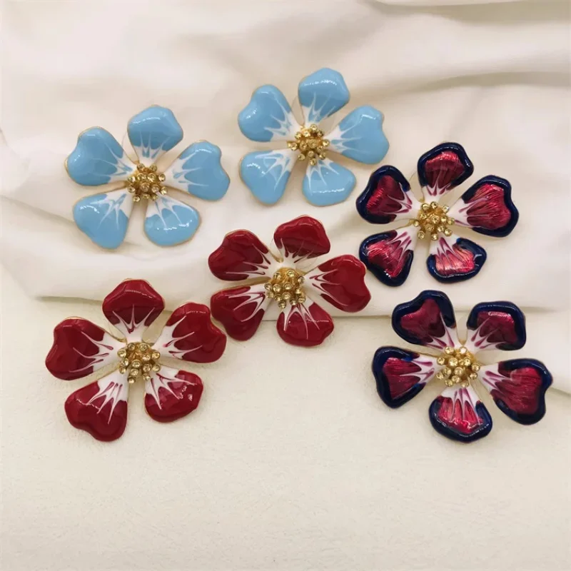 

Early Spring New Fresh Blue And White Enamel Enamel Set With Diamond Cherry Blossom Earrings Fresh Retro Flower Jewelry Women