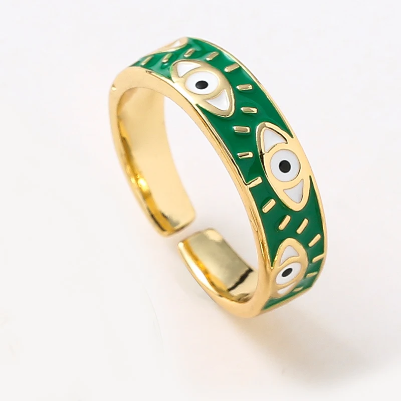 Anel dourado e verde