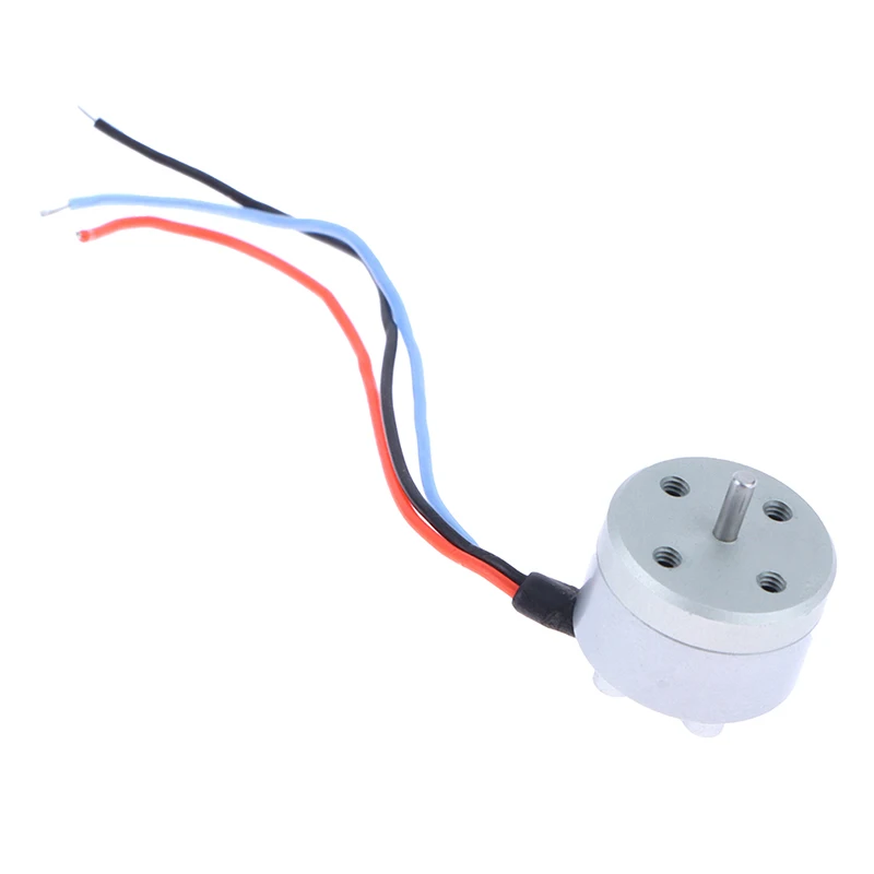 Micro moteur sans balais 1104 4300KV comparé à une pièce de monnaie, illustrant sa taille compacte pour drone FPV