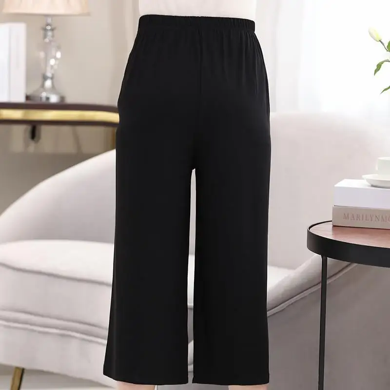 2024 New Summer Loose Casual Simple Elastic Waist Pocket Straight Tube Solid Color Versatile Cropped Wide Leg Pants for Women