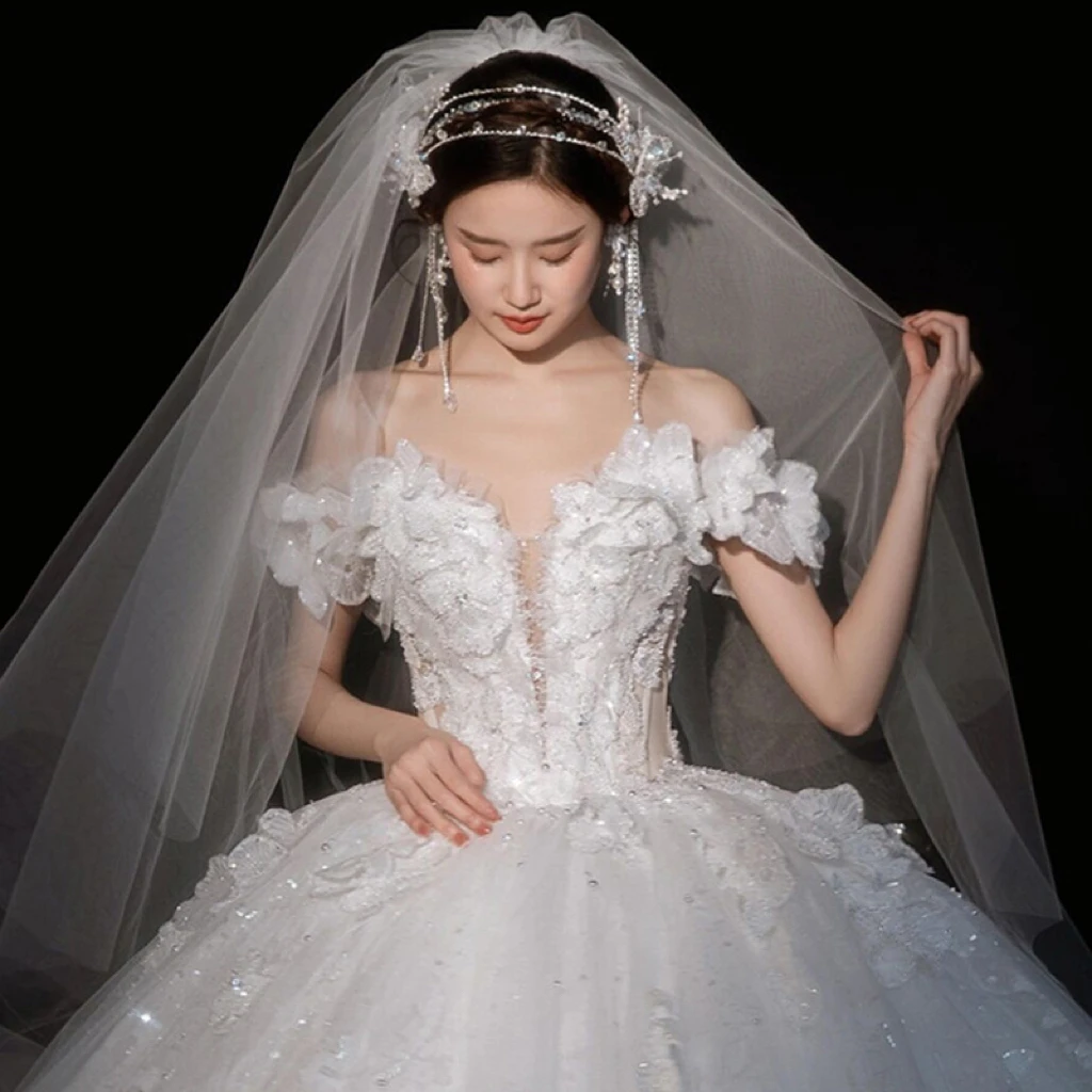 

Luxury Wedding Dress Sweetheart Flower Applique Spaghetti Strap Sequined Dubai Off Shoulder Glitter Ball Princess Bridal Gowns