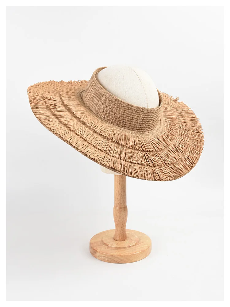 2023 New Fashion Women's Large Eaves Sun Summer Designer Beach UV Protection Empty Top Tassel Straw Hat Wholesale_voghion.com
