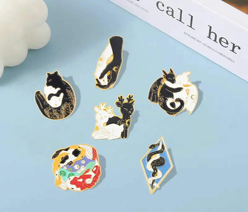 

Starry Hugging Animals Enamel Pins Custom Sun Moon Cat Deer Dragon Snake Koi Hands Brooches Lapel Badge Black White Jewelry Gift