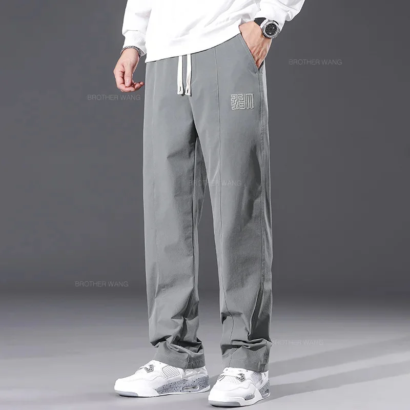 thumbnail image 1 of Pantalones casuales de pierna ancha y cómodos para hombre, estilo nuevo, de tela de nailon, con cintura elástica, rectos, de moda, primavera de 2024, 1 of 5