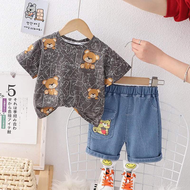 

Toddler Boy Summer Outfits Korean Fashion Cartoon Printed Short Sleeve T-shirts Tops and Denim Shorts Two Piece Set Kids Clothes