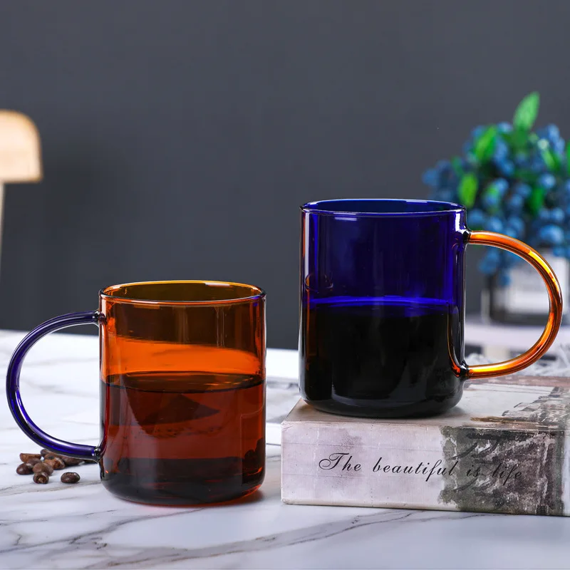 https://ae01.alicdn.com/kf/Scbac4f3043454e6db3833a27ad2d15d60/Simple-Brief-Glass-Coffee-Mug-2-Tone-Amber-and-Blue-Glass-Cup-Heat-Resistant-Nordic-Milk.jpg