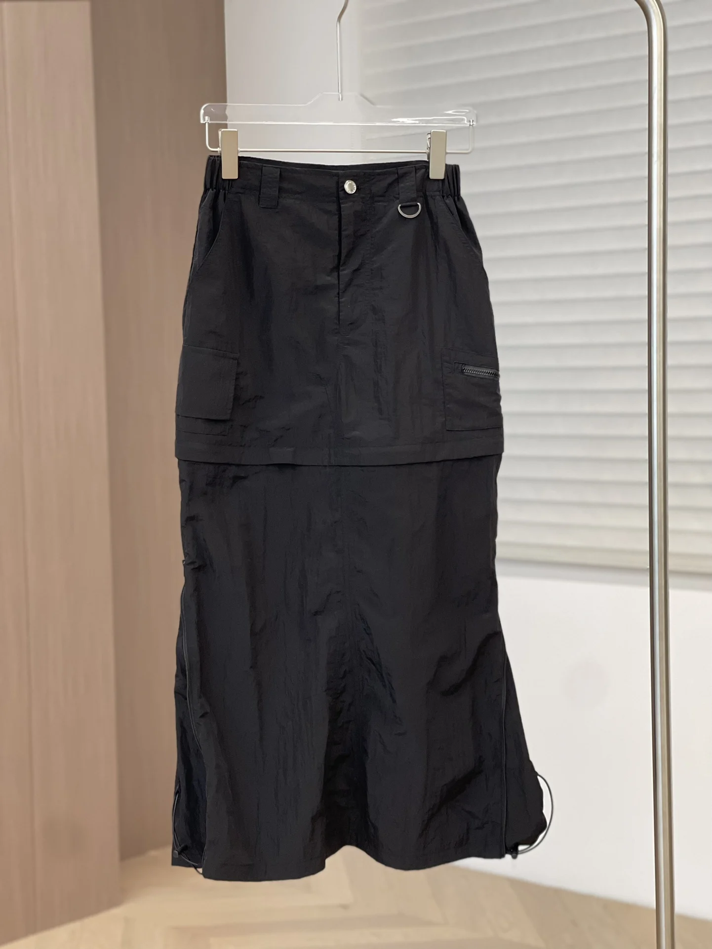 

2023 Spring and summer new zipper split half skirt function outdoor wind can be two wear design sense of super