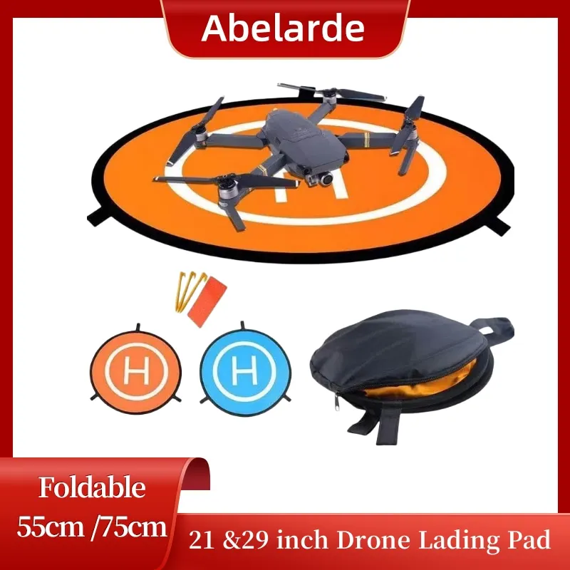 Tapis d'atterrissage pour drone RC de 55cm, surface imperméable avec motif hexagone, posé sur herbe avec drone DJI Mavic 3 prêt à atterrir.
