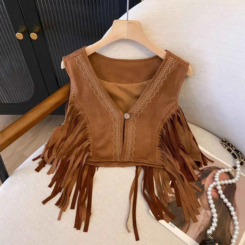 

Модный женский жилет в полоску с вышивкой и кисточками