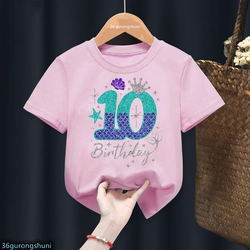 thumbnail image 1 of Bonita ropa para niños, regalo de sexto cumpleaños, camiseta de algodón para niñas, camiseta con estampado de corona de princesa sirena, camisetas rosas Harajuku Kawaii, 1 of 5
