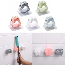 1pc Wall Mounted Mop Organizer Holder Brush Broom Hanger Home Storage Rack Bathroom Suction Hanging Pipe Hooks Home Tools tanie i dobre opinie CN (pochodzenie) PA and PE 1xMop clip Mop Broom Holder Wall Mounted Mop Holder Kitchen Bathroom Organizer Behind Doors On Walls