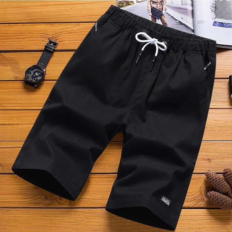 2023 new summer men's shorts casual white simple and relaxed tide brand five-point sports beach pants pants