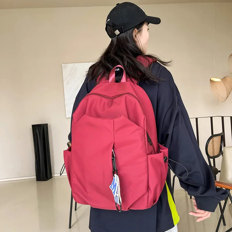 

Female Bags on Sale 2023 High Quality Fashionable and Large Capacity Waterproof Backpack Nylon Solid Leisure Zipper Backpacks