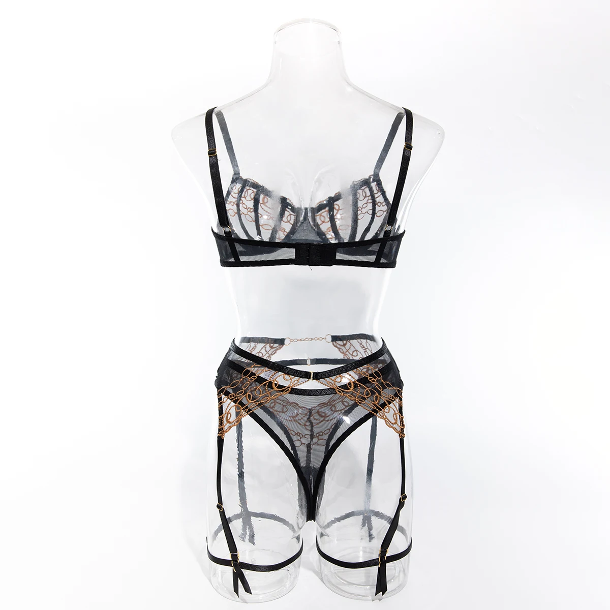 Conjunto de sujetador, tanga y liguero negro con precioso bordado marrón