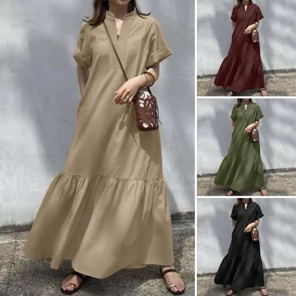 

Женское платье макси с воротником-стойкой и боковыми карманами