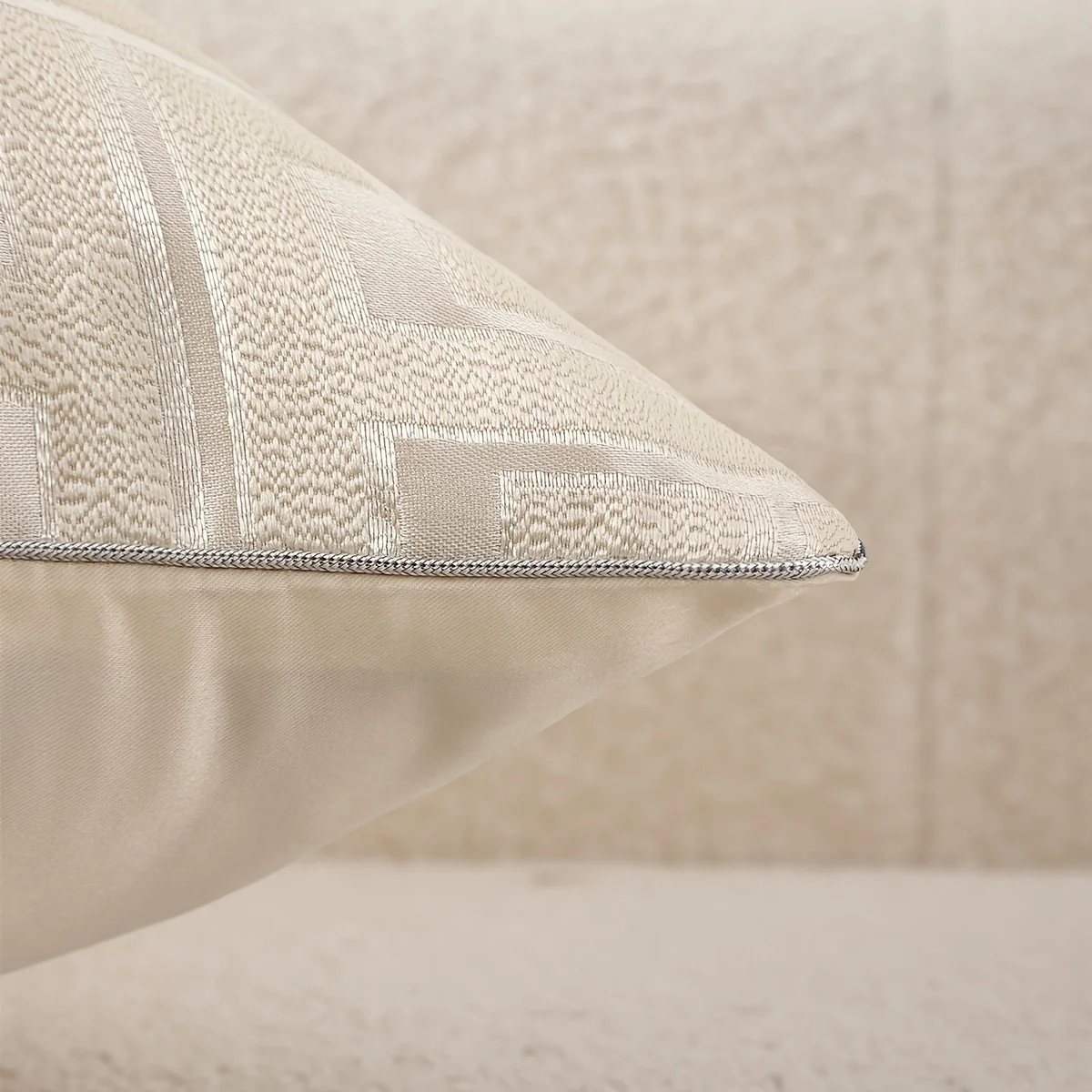 Beige jacquard fabric texture and finished edge